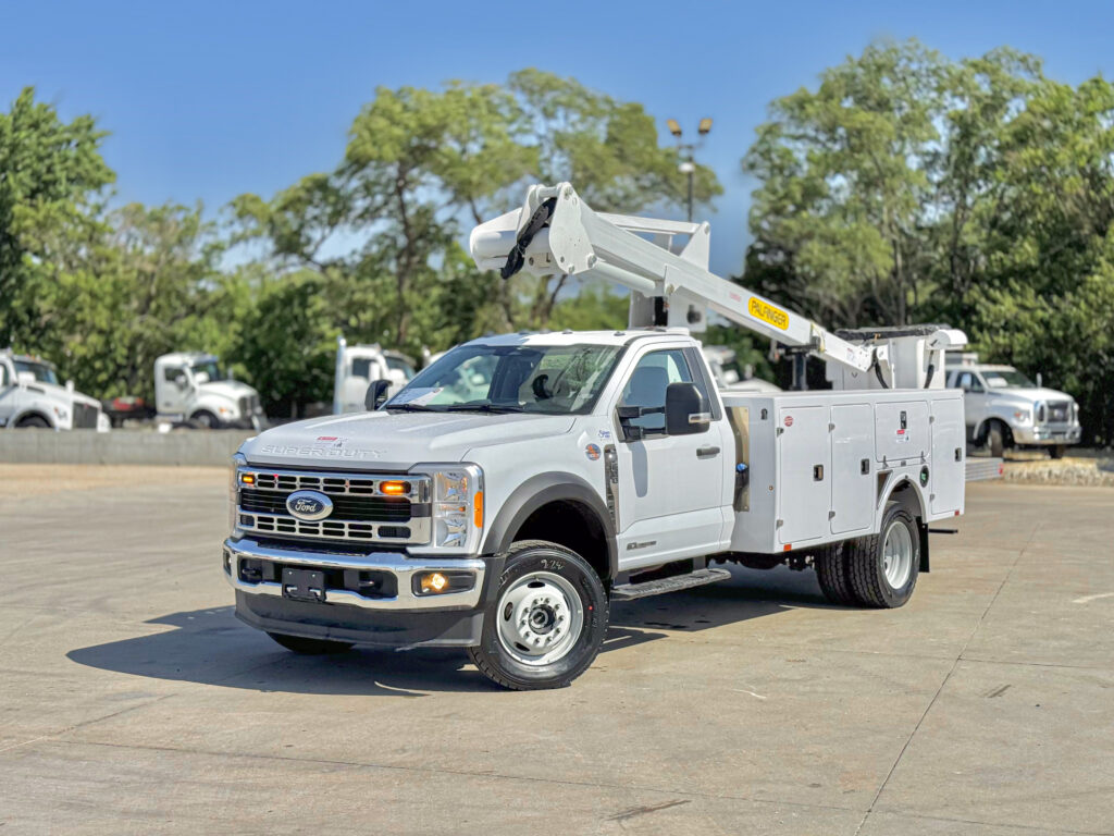 White Ford MTTE Built Aerial truck in the Midwest.