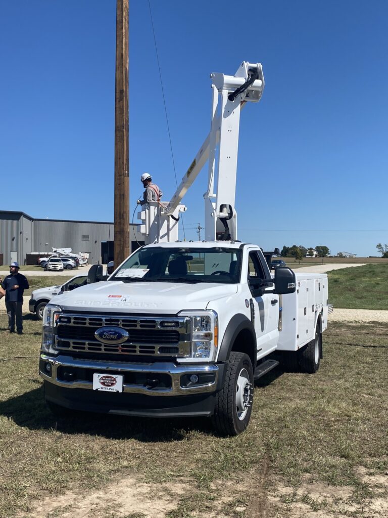White Medium Duty Bucket Truck by MTTE in Action